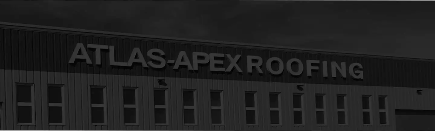 Atlas-Apex Roofing crew photographed on a commercial roof